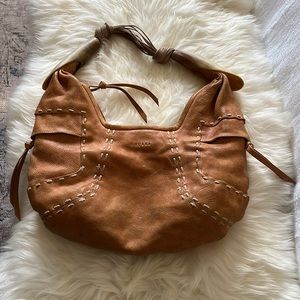 Ghurka leather shoulder bag with storage bag